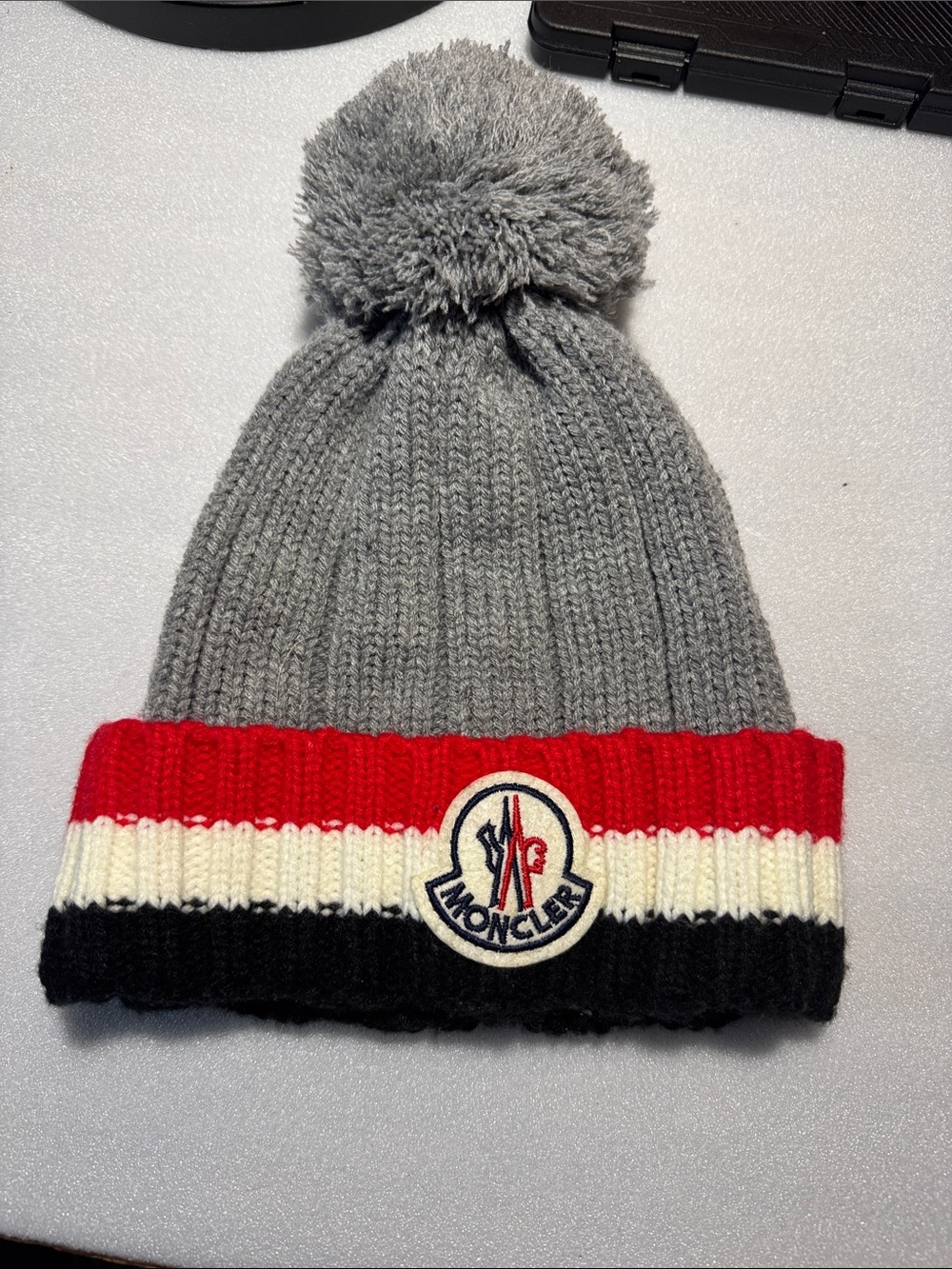Moncler Kids Gray Knit Pom Beanie with Red, White & Black Stripe Cuff